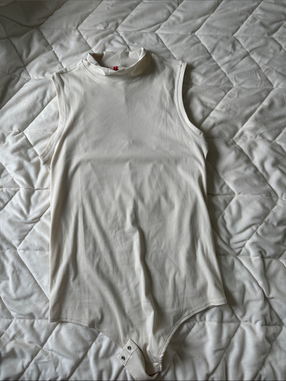SPANX Sleeveless Mock Neck Bodysuit in Cream